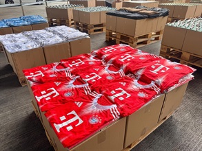 Hong Kong Customs conducted a four-week enforcement operation codenamed "Ocean Shield" from May 28 to June 27 to combat counterfeit and infringing goods activities involving cross-boundary transshipments by sea cargo and local deliveries. During the operation, Customs detected 36 related cases and seized about 157 000 items of suspected counterfeit goods with an estimated market value of over $72 million. Photo shows some of the suspected counterfeit jerseys seized.