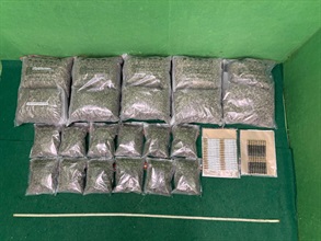 Hong Kong Customs today (July 4) detected a passenger drug trafficking case at Hong Kong International Airport and seized about 11.2 kilograms of suspected cannabis buds and 50 sticks of vapes with suspected cannabis oil with a total estimated market value of about $2.4 million. One man was arrested. Photo shows the suspected cannabis buds and the vapes with suspected cannabis oil seized.