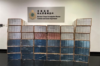 Hong Kong Customs has been mounting a territory-wide enforcement operation codenamed "Thunder" starting this week to combat illicit cigarette telephone-ordering activities. A suspected storage centre for duty-not-paid cigarettes, commonly known as "cheap whites", was shut down yesterday (July 8), and a total of about 1.15 million suspected duty-not-paid "cheap whites" with an estimated market value of about $5.2 million and a duty potential of about $3.8 million were seized. One person involved in the case was arrested. Photo shows some of the suspected duty-not-paid "cheap whites" seized.