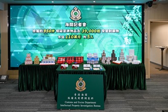 Hong Kong Customs yesterday (July 9) mounted a special enforcement operation in Causeway Bay, Tsim Sha Tsui and Sheung Shui to combat the sale of counterfeit goods, and seized about 950 items of suspected counterfeit goods and about 39 000 tablets of suspected controlled medicines with a total estimated market value of about $1.1 million. Photo shows the suspected counterfeit goods and suspected controlled medicines seized.