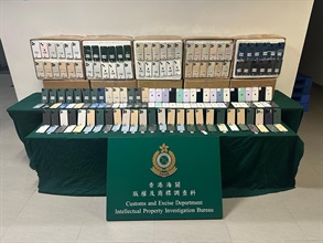 Hong Kong Customs on June 13 seized about 800 suspected counterfeit mobile phones with an estimated market value of about $1.2 million at the Hong Kong-Zhuhai-Macao Bridge Hong Kong Port. Photo shows the suspected counterfeit mobile phones seized.