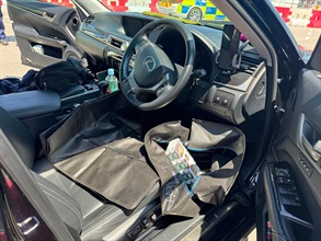 A 59-year-old man was sentenced to 10 months' imprisonment at the West Kowloon Magistrates' Courts on July 10 for importing duty-not-paid cigarettes, in contravention of the Dutiable Commodities Ordinance. Photo shows the duty-not-paid cigarettes seized from the driver's seat of the man's vehicle.