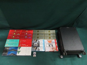 An incoming 68-year-old female passenger was sentenced to four weeks' imprisonment at the Fanling Magistrates' Courts today (July 14) for possessing duty-not-paid cigarettes and failing to declare them to Customs officers, in contravention of the Dutiable Commodities Ordinance. Photo shows the duty-not-paid cigarettes seized.