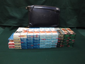 An incoming 43-year-old female passenger was sentenced to two months' imprisonment and fined $1,500 at the Fanling Magistrates' Courts today (July 15) for possessing 10 600 duty-not-paid cigarettes and failing to declare them to Customs officers at the Lo Wu Control Point, in contravention of the Dutiable Commodities Ordinance. Photo shows the duty-not-paid cigarettes seized.