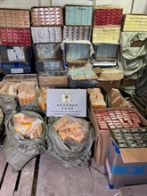 Hong Kong Customs shut down two suspected illicit cigarette storage centres in Sham Shui Po today (July 16), seizing a total of about 1 million suspected illicit cigarettes with an estimated market value of about $4.5 million and a duty potential of about $3.3 million. One 45-year old non-local man was arrested. Photo shows a suspected illicit cigarette storage centre and some of the suspected illicit cigarettes seized.