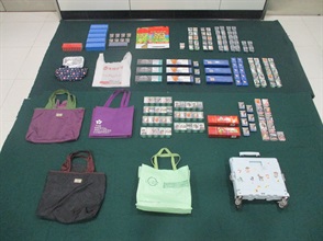 An incoming 47-year-old female passenger was sentenced to two months' imprisonment and fined $1,500 at the Fanling Magistrates' Courts today (July 21) for possessing 7 080 duty-not-paid cigarettes and failing to declare them to Customs officers at the Lok Ma Chau Spur Line Control Point, in contravention of the Dutiable Commodities Ordinance. Photo shows the duty-not-paid cigarettes seized.