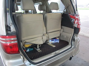 A 32-year-old man was convicted at the West Kowloon Magistrates' Courts on August 6 for importing duty-not-paid cigarettes and making use of an altered structure of a vehicle for the purpose of smuggling articles, in contravention of the Dutiable Commodities Ordinance and the Import and Export Ordinance. He was sentenced to four months' imprisonment for each of the charges that will run concurrently. Photo shows the private car used to smuggle the duty-not-paid cigarettes.