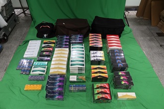 An incoming 48-year-old female passenger was sentenced to four months' imprisonment and fined $1,000 at the West Kowloon Magistrates' Courts today (August 12) for possessing duty-not-paid cigarettes and failing to declare them to Customs officers, in contravention of the Dutiable Commodities Ordinance. Photo shows the duty-not-paid cigarettes seized.