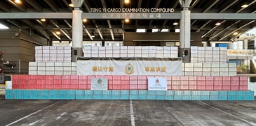 Hong Kong Customs has long been committed to promoting Customs co-operation in the Asia-Pacific region to combat cross-boundary illicit cigarette activities at source. Fruitful results have been achieved, with various kinds of cross-boundary cigarette smuggling cases detected. During the first half of this year, Customs detected 84 large-scale illicit cigarette smuggling cases and seized about 278 million illicit cigarettes in total, with an estimated market value of about $1.25 billion and a duty potential of about $920 million. Photo shows some of the illicit cigarettes seized.