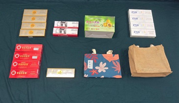 An incoming 53-year-old female passenger was sentenced to six weeks' imprisonment at the Fanling Magistrates' Courts today (August 25) for possessing duty-not-paid cigarettes and failing to declare them to Customs officers, in contravention of the Dutiable Commodities Ordinance. Photo shows the duty-not-paid cigarettes seized.