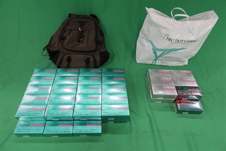 A 26-year-old incoming male passenger was sentenced to three months’ imprisonment by the West Kowloon Magistrates' Courts today (September 26) for importing alternative smoking products, in contravention of the Import and Export Ordinance. Photo shows the alternative smoking products seized.