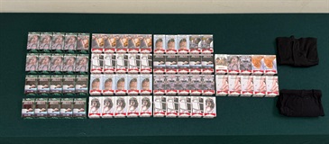 An 80-year-old incoming female passenger was sentenced to two months' imprisonment and fined $2,000 by the Fanling Magistrates' Courts today (September 29) for possessing 1 400 sticks of duty-not-paid cigarettes and failing to declare them to Customs officers, in contravention of the Dutiable Commodities Ordinance. Photo shows the duty-not-paid cigarettes seized.