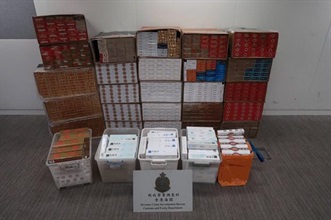 A woman was sentenced to 10 months' imprisonment at the West Kowloon Magistrates' Courts today (September 29) for dealing with duty-not-paid cigarettes, in contravention of the Dutiable Commodities Ordinance. Photo shows the illicit cigarettes seized.