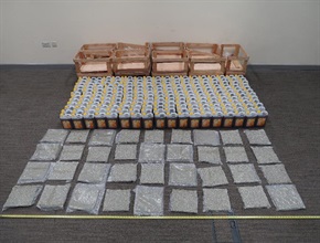 Hong Kong Customs seized about 10 kilograms of suspected cannabis buds with an estimated market value of about $2 million at Hong Kong International Airport on February 25. One man was subsequently arrested today (March 1). Photo shows the suspected cannabis buds seized and the wooden crates used to conceal the dangerous drugs.