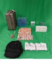 Hong Kong Customs detected a smuggling case involving a passenger at Hong Kong International Airport and seized 1 746 pieces of pharmaceutical injections containing Part I Poisons, 8 080 tablets of pharmaceutical products containing Part I Poisons and 74 tubes of pharmaceutical ointment containing Part I Poisons. The total estimated market value was about $1.3 million. Photo shows the pharmaceutical injections, pharmaceutical products and pharmaceutical ointment seized.