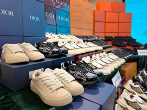 Hong Kong Customs conducted a two-week enforcement operation codenamed "Hot Shoes" from October 6 to 17 to combat counterfeit footwear products via cross-boundary transshipment cargo. During the operation, Customs detected nine related cases and seized about 18 000 items of suspected counterfeit goods, including footwear and clothing, with an estimated market value of over $10 million. Photo shows some of the suspected counterfeit footwear seized.
