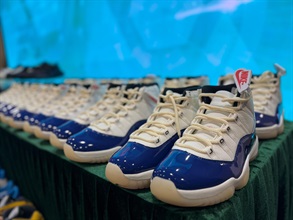 Hong Kong Customs conducted a two-week enforcement operation codenamed "Hot Shoes" from October 6 to 17 to combat counterfeit footwear products via cross-boundary transshipment cargo. During the operation, Customs detected nine related cases and seized about 18 000 items of suspected counterfeit goods, including footwear and clothing, with an estimated market value of over $10 million. Photo shows some of the suspected counterfeit sports shoes seized.