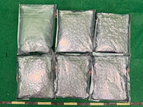 Hong Kong Customs detected two drug trafficking cases involving baggage concealment at Hong Kong International Airport yesterday (October 25) and today (October 26) and seized a total of about 30.5 kilograms of suspected cannabis buds with a total estimated market value of about $6.1 million. Photo shows the suspected cannabis buds seized in the first case.