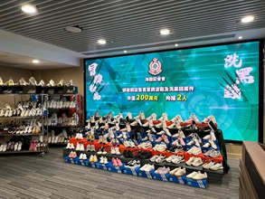 Hong Kong Customs mounted a special enforcement operation on October 20 and detected a case involving the sale of suspected counterfeit footwear products and money laundering by an online shop. A total of about 1 100 items of suspected counterfeit goods, with a total estimated market value of about $2 million, were seized. Photo shows some of the suspected counterfeit goods seized.
