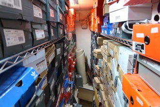 Hong Kong Customs mounted a special enforcement operation on October 20 and detected a case involving the sale of suspected counterfeit footwear products and money laundering by an online shop. A total of about 1 100 items of suspected counterfeit goods, with a total estimated market value of about $2 million, were seized. Photo shows a storage unit in Tsuen Wan which is suspected to be used for storing counterfeit goods.