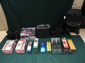 A 31-year-old incoming female passenger was sentenced to six weeks' imprisonment and fined $4,000 by the Fanling Magistrates' Courts today (November 5) for possessing duty-not-paid cigarettes and failing to declare them to Customs officers, in contravention of the Dutiable Commodities Ordinance. Photo shows the duty-not-paid cigarettes seized and the baby stroller used to conceal the duty-not-paid cigarettes.