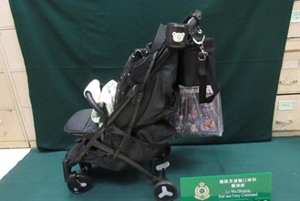A 31-year-old incoming female passenger was sentenced to six weeks' imprisonment and fined $4,000 by the Fanling Magistrates' Courts today (November 5) for possessing duty-not-paid cigarettes and failing to declare them to Customs officers, in contravention of the Dutiable Commodities Ordinance. Photo shows the baby stroller used to conceal the duty-not-paid cigarettes.