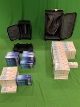 A 45-year-old incoming male passenger was sentenced to 24 weeks' imprisonment with a fine of $2,000 at the West Kowloon Magistrates' Courts today (November 10) for possession of duty-not-paid cigarettes and failing to declare them to Customs officers, in contravention of the Dutiable Commodities Ordinance. Photo shows the duty-not-paid cigarettes seized.