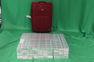 A 29-year-old incoming male passenger was sentenced to three months' imprisonment and fined $500 by the West Kowloon Magistrates' Courts today (November 24) for possessing duty-not-paid cigarettes and failing to declare them to Customs officers, in contravention of the Dutiable Commodities Ordinance. Photo shows the duty-not-paid cigarettes seized.