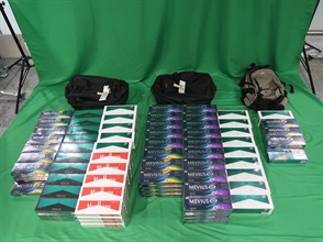 A 38-year-old incoming female passenger was sentenced to three months' imprisonment and fined $500 by the West Kowloon Magistrates' Courts today (December 3) for dealing with duty-not-paid cigarettes and failing to declare them to Customs officers, in contravention of the Dutiable Commodities Ordinance. Photo shows the duty-not-paid cigarettes seized.