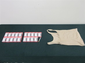 A 62-year-old incoming female passenger was sentenced to two months' imprisonment by the Fanling Magistrates' Courts today (December 19) for possessing duty-not-paid cigarettes and failing to declare them to Customs officers, in contravention of the Dutiable Commodities Ordinance. Photo shows the duty-not-paid cigarettes seized.