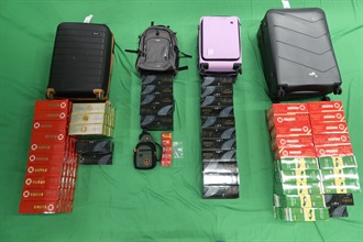 A 35-year-old incoming male passenger was sentenced to five months' imprisonment and fined $1,500 by the West Kowloon Magistrates' Courts today (December 20) for possession of duty-not-paid cigarettes and failing to declare them to Customs officers, in contravention of the Dutiable Commodities Ordinance. Photo shows the duty-not-paid cigarettes seized.