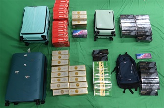 A 30-year-old incoming male passenger was sentenced to five months' imprisonment and fined $1,500 by the West Kowloon Magistrates' Courts today (December 20) for possession of duty-not-paid cigarettes and failing to declare them to Customs officers, in contravention of the Dutiable Commodities Ordinance. Photo shows the duty-not-paid cigarettes seized.