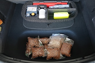 Hong Kong Customs today (December 20) detected a suspected smuggling case involving a private car at the Heung Yuen Wai Boundary Control Point and seized 12 kilograms suspected smuggled Cattle Gallstones with a total estimated market value of about $13.78 million. Photo shows the suspected smuggled Cattle Gallstones seized from the rear trunk of the private car.