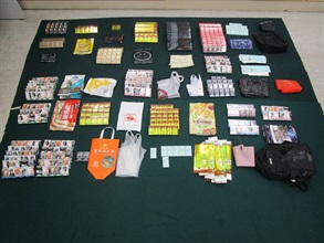A 41-year-old incoming female passenger was sentenced to four months' imprisonment with a fine of $1,200 by the Fanling Magistrates' Courts today (January 8) for importing duty-not-paid cigarettes and failing to declare them to Customs officers, in contravention of the Dutiable Commodities Ordinance. Photo shows the duty-not-paid cigarettes seized.