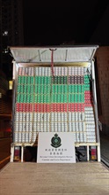 Hong Kong Customs detected a suspected illicit cigarette distribution case in Yau Tong yesterday (January 28), seizing about 1.81 million suspected illicit cigarettes with an estimated market value of about $8.14 million and a duty potential of about $5.98 million. One man was arrested. Photo shows the suspected illicit cigarettes seized inside a lorry.