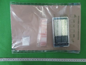 Hong Kong Customs seized about 1.7 kilograms of suspected liquid cocaine and a small quantity of suspected ketamine with a total estimated market value of about $2.25 million in Kwai Chung and Tseung Kwan O respectively on February 17 and today (February 22). Photo shows the suspected ketamine and suspected drug packaging paraphernalia seized.