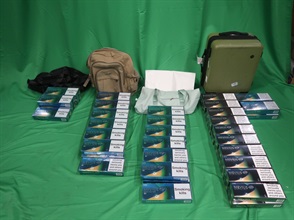 An incoming male passenger was sentenced to two months' imprisonment and fined $2,000 by the Kowloon City Magistrates' Courts today (February 7) for importing duty-not-paid cigarettes and failing to declare them to Customs officers, in contravention of the Dutiable Commodities Ordinance. Photo shows the duty-not-paid cigarettes seized.