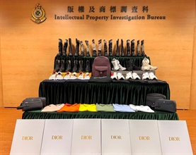 Hong Kong Customs on January 31 seized about 4 200 suspected counterfeit goods including footwear, bags and clothing, with an estimated market value of about $2.8 million, at Hong Kong International Airport. Photo shows the suspected counterfeit goods seized.