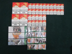 一名入境女旅客因進口未完稅香煙及未有向海關人員作出申報，違反《應課稅品條例》，今日（二月十三日）在粉嶺裁判法院被判處監禁六星期，以及罰款四千元。圖示檢獲的未完稅香煙。