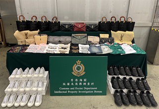 Hong Kong Customs on February 12 seized about 1900 suspected counterfeit goods, including footwear, bags and clothing, with an estimated market value of about $1.3 million at Hong Kong International Airport. Photo shows the suspected counterfeit goods seized.