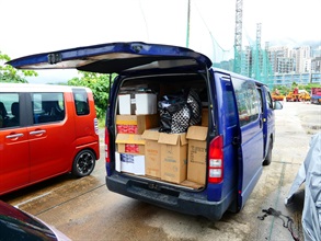 Hong Kong Customs detected a suspected illicit cigarette and alternative smoking product storage and distribution case in Ma On Shan yesterday (July 7). A total of about 390 000 suspected illicit cigarettes and 15 000 alternative smoking products were seized. The total estimated market value was about $1.78 million while the duty potential was about $1.3 million. A local man was arrested. Photo shows a light goods vehicle connected with the case.