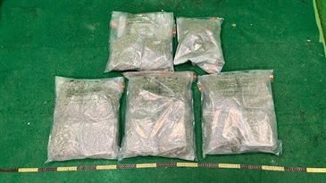 Hong Kong Customs detected a drug trafficking case involving two incoming air passengers at Hong Kong International Airport yesterday (March 14) and seized about 8 kilograms of suspected cannabis buds with an estimated market value of about $1.7 million. Photo shows the suspected cannabis buds seized.