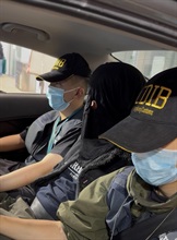 Hong Kong Customs detected two dangerous drugs cases at Hong Kong International Airport and Ho Man Tin on March 21 and yesterday (March 23) respectively, and seized a total of about 8 kilograms of suspected ketamine, about 2.3kg of suspected cocaine and about 1.1kg of suspected crack cocaine, with a total estimated market value of about $6.6 million. Three persons suspected to be connected with the cases were arrested. Photo shows an arrested man (centre) in the second case.