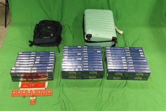 An incoming male passenger was sentenced to three months' imprisonment and fined $1,000 by the West Kowloon Magistrates' Courts today (March 30) for importing duty-not-paid cigarettes and failing to declare them to Customs officers, in contravention of the Dutiable Commodities Ordinance. Photo shows the duty-not-paid cigarettes seized.