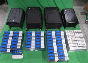 An incoming male passenger was sentenced to six months’ imprisonment and fined $500 by the West Kowloon Magistrates' Courts today (April 9) for dealing with duty-not-paid cigarettes and failing to declare them to Customs officers, in contravention of the Dutiable Commodities Ordinance. Photo shows the duty-not-paid cigarettes seized.