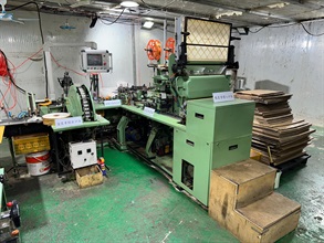 Hong Kong Customs shut down an underground cigarette factory in Fanling yesterday (April 9), and seized about 31.92 tons of suspected duty-not-paid manufactured tobacco and 1.23 million sticks of suspected illicit cigarette. The total estimated market value of all seizure was about $220 million, while the duty potential was about $130 million. Six persons suspected to be connected with the case were arrested. Photo shows the machines for producing and packaging illicit cigarettes seized in the metal hut.