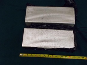 Hong Kong Customs on April 14 detected a suspected smuggling case involving a medium goods vehicle at the Lok Ma Chau Boundary Control Point and seized about 63 kilograms of suspected smuggled silver ingots with an estimated market value of about $1.2 million. Photo shows the suspected smuggled silver ingots seized.
