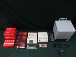An incoming female passenger was sentenced to four months' imprisonment and fined $1,000 by the Fanling Magistrates' Courts today (April 17) for possessing duty-not-paid cigarettes and failing to declare them to Customs officers, in contravention of the Dutiable Commodities Ordinance. Photo shows the duty-not-paid cigarettes seized.