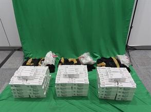 Eight incoming passengers were sentenced between eight to twelve months' imprisonment and fined $2,000 by the West Kowloon Magistrates' Courts today (April 18) for importing and dealing with duty-not-paid cigarettes and failing to declare them to Customs officers, in contravention of the Dutiable Commodities Ordinance (DCO). Photo shows the duty-not-paid cigarettes seized from the personal baggages of two of the eight incoming passengers.