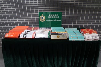 A 52-year-old man was sentenced to three months' imprisonment with a fine of $1,000 by the Fanling Magistrates' Courts today (April 18) for importing duty-not-paid cigarettes using a cross-boundary private car, in contravention of the Dutiable Commodities Ordinance. Photo shows the duty-not-paid cigarettes seized.